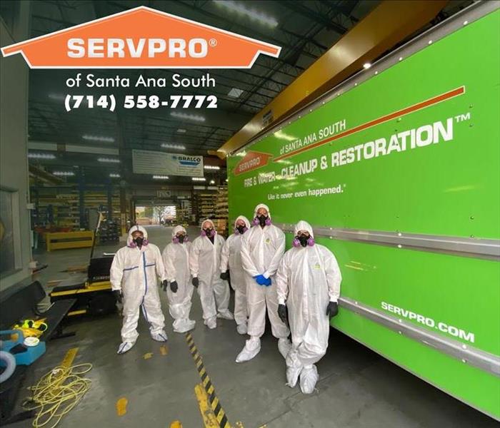 SERVPRO team in hazmat suits