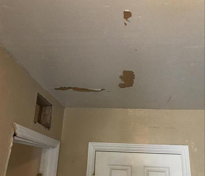 peeling paint on ceiling from water leak