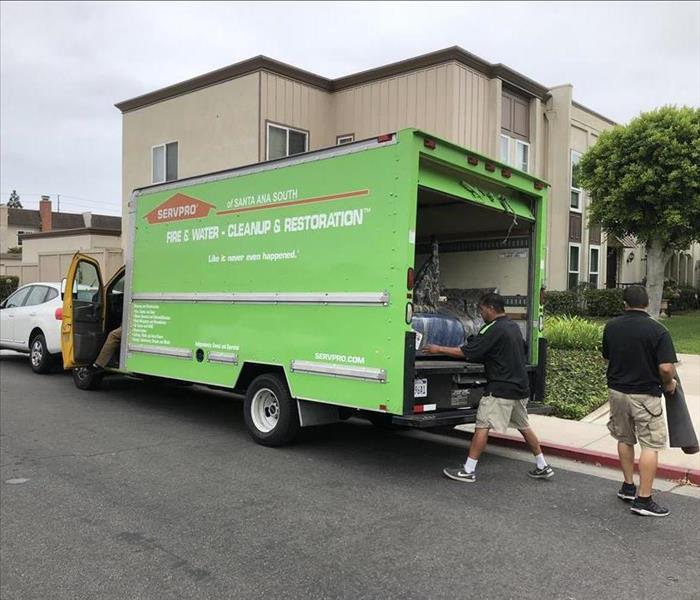 SERVPRO boxtruck returning stored contents to an apt unit