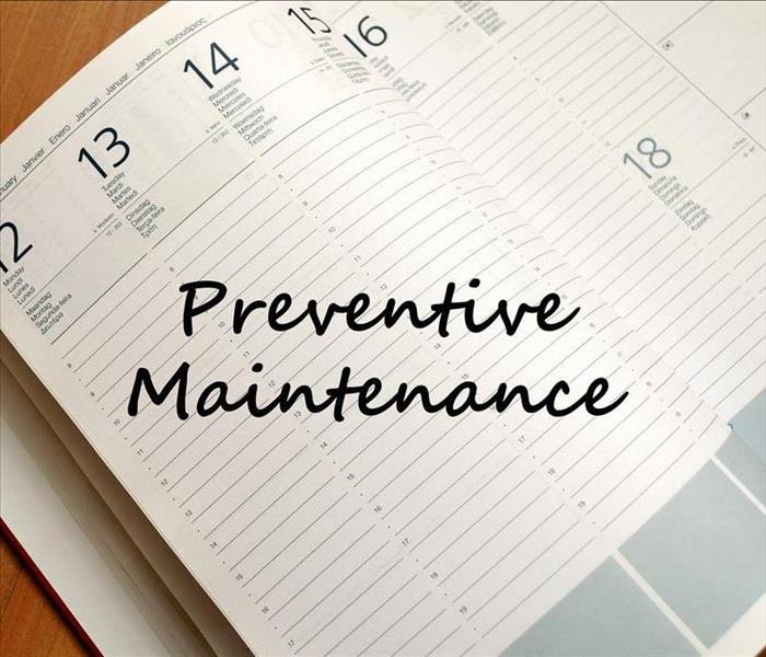 Preventive maintenance text concept write on notebook with pen